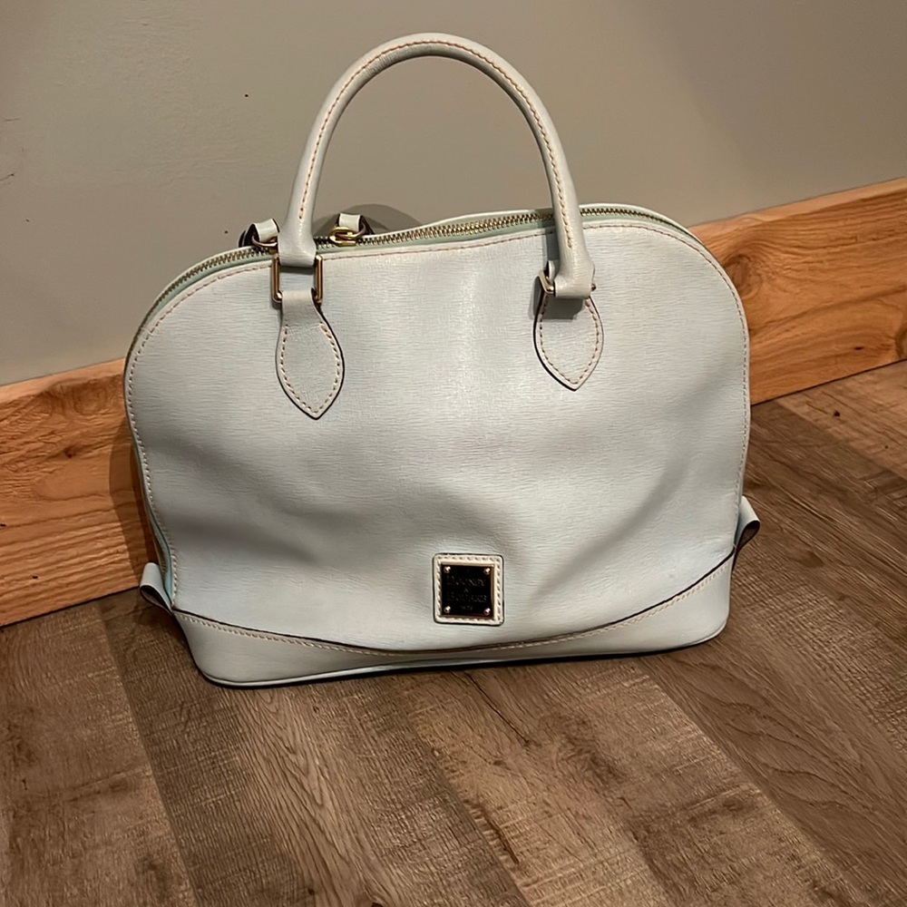 Dooney and Bourke Light blue handbag 12” W x 9”H x 10” D opening